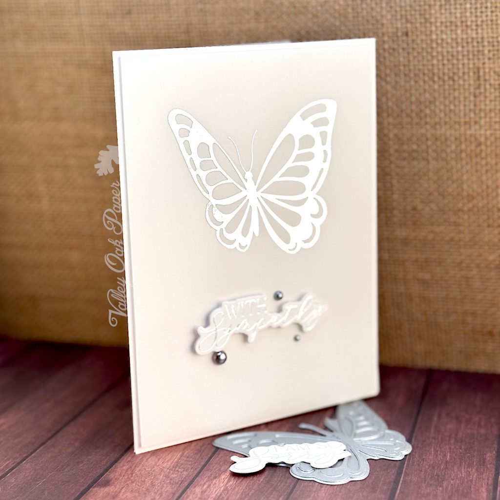 Greeting card showing the greeting "With Sympathy" and a large butterfly.